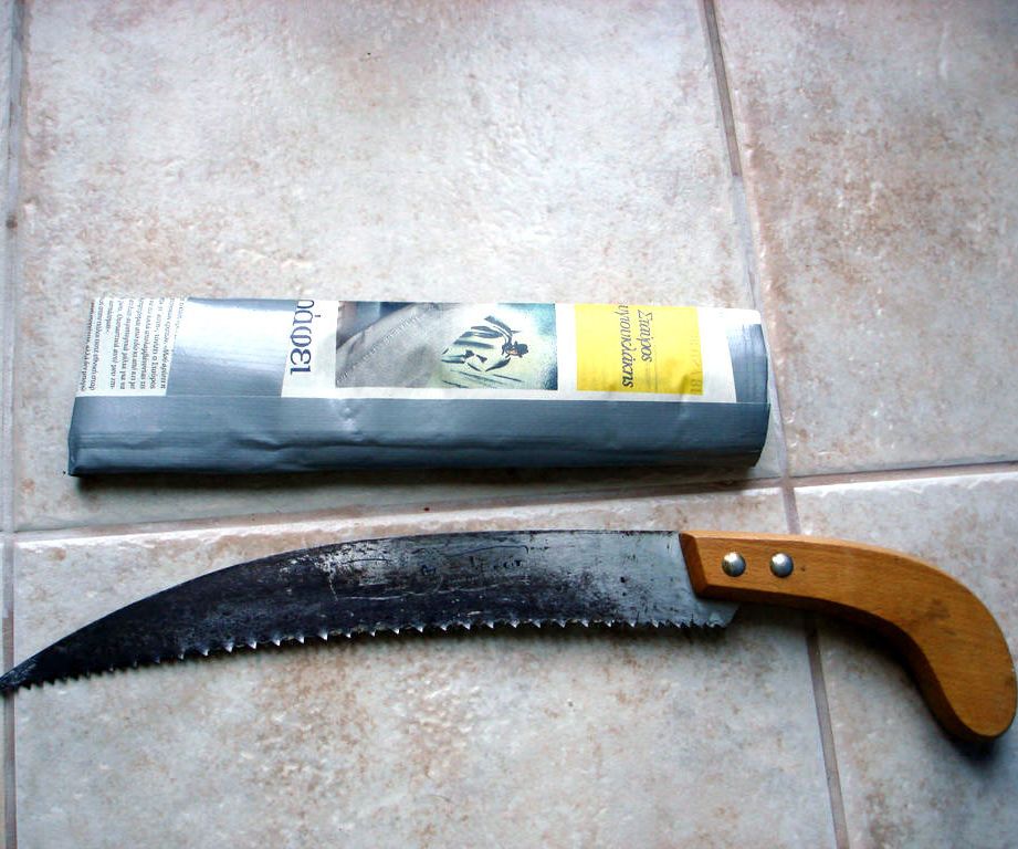 Wood Saw Sleeve From Newspapers