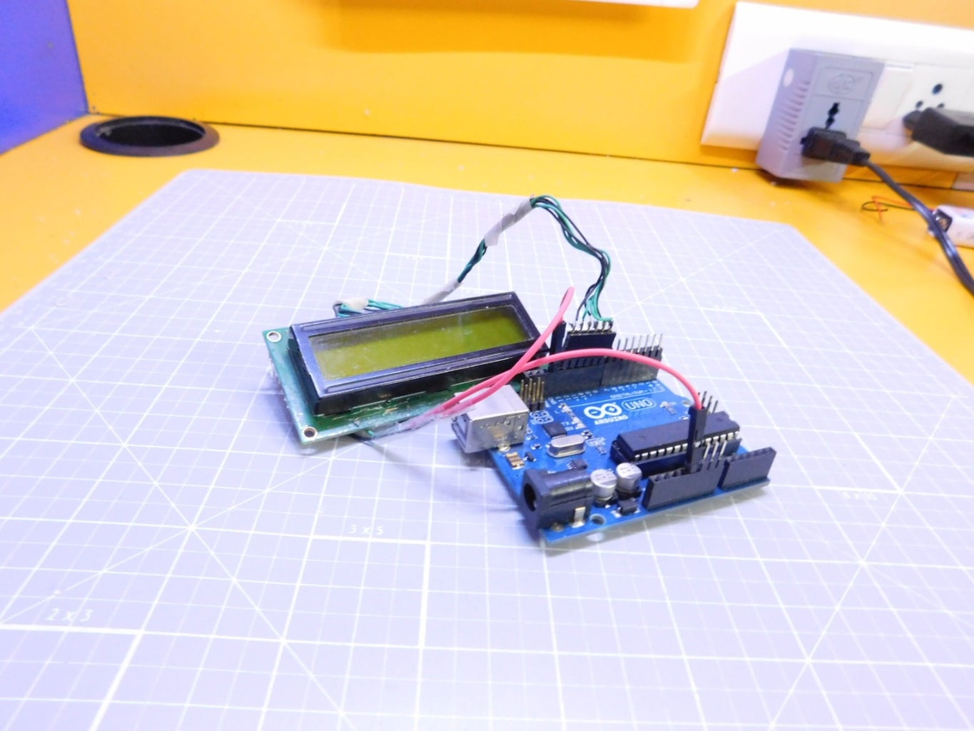 Connect the LCD to Arduino