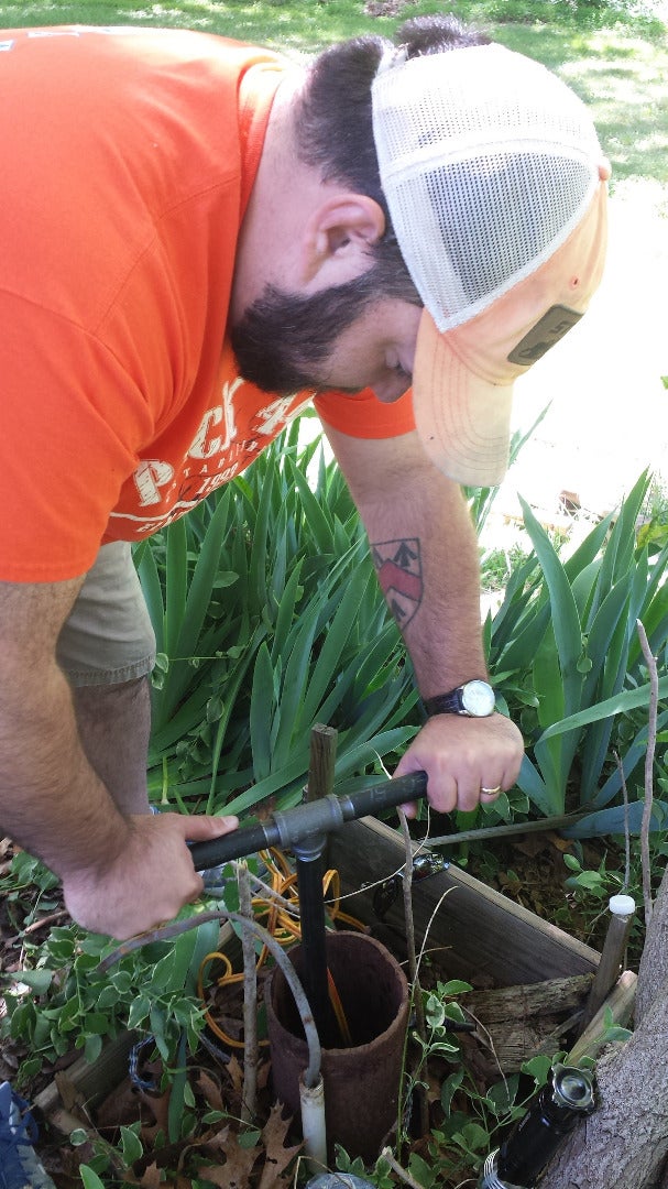 Here's What It Looks Like to Try to Line the Threads Up on the Pitless Connector.
