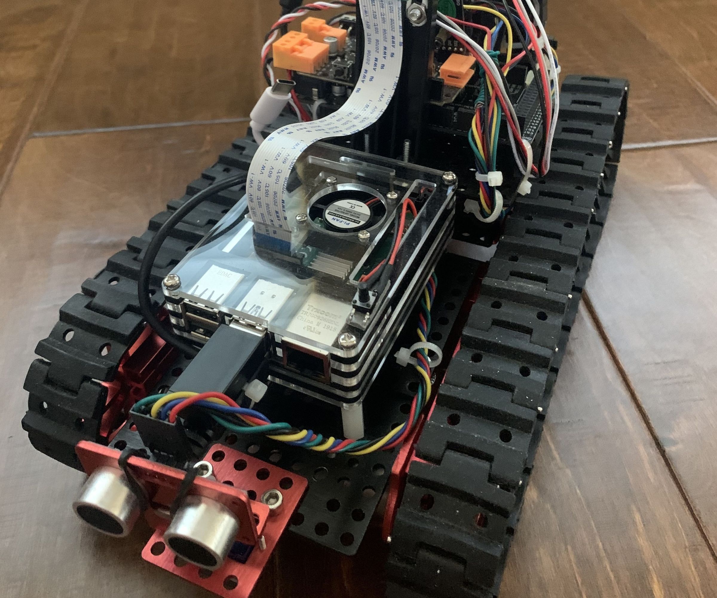 Beginner's Self-Driving Robotic Vehicle With Collision Avoidance