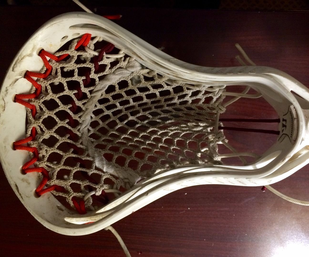 Stinging a Lacrosse Stick
