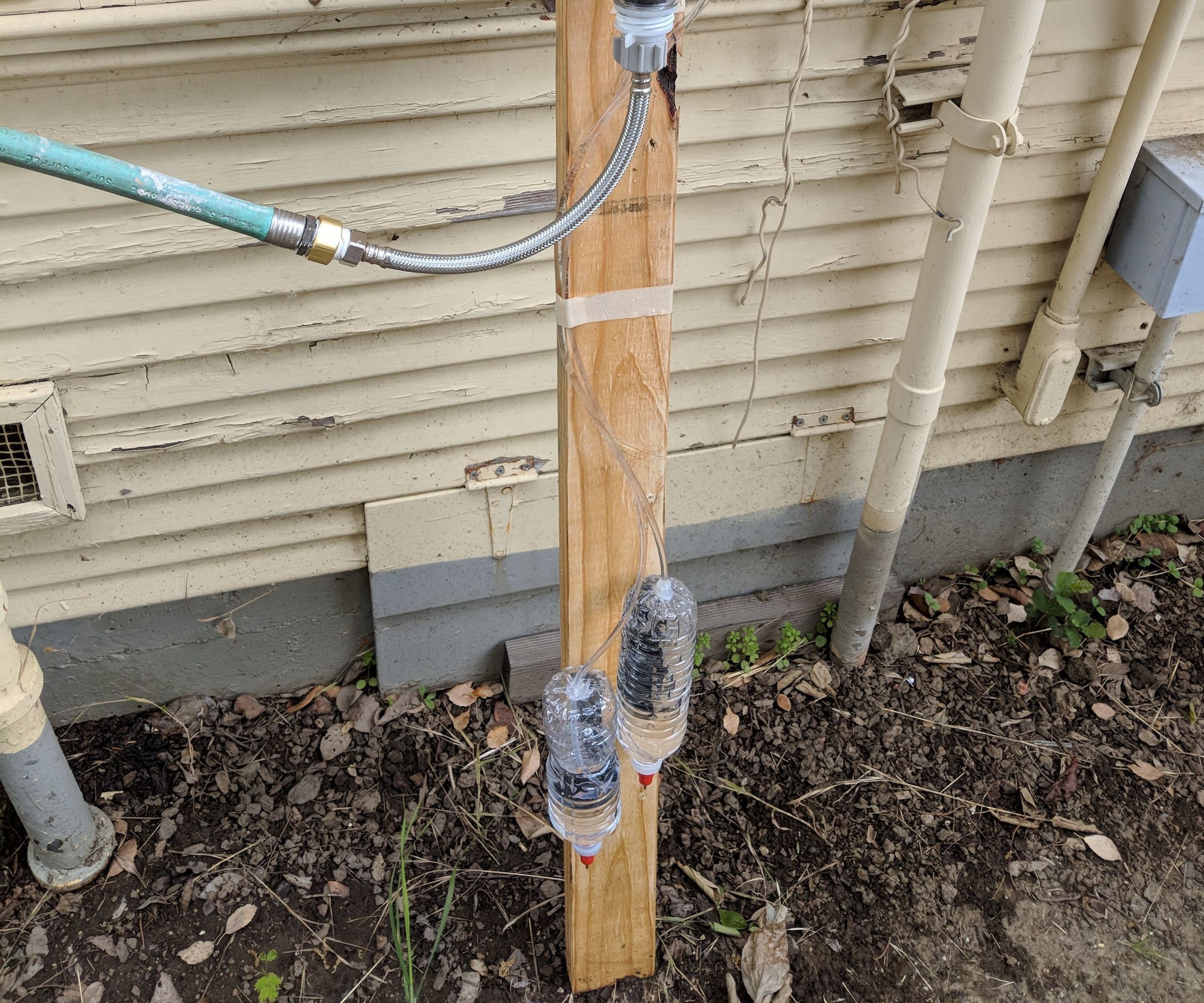 Automatic Chicken Watering System With Upcycled Bottles