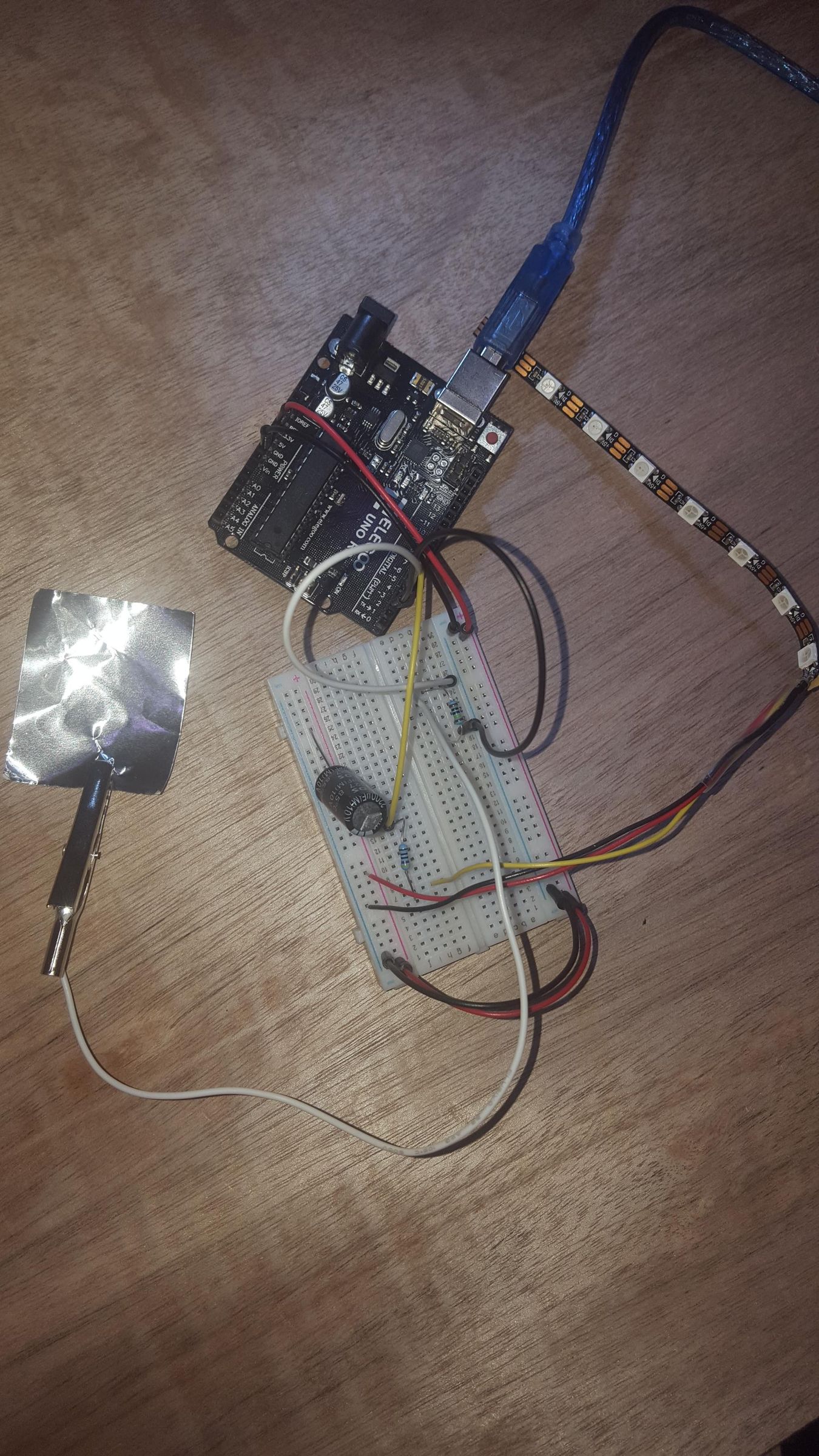 Capacitive Sensor to Turn on Neopixel LED's (w/ Arduino) 4 Steps