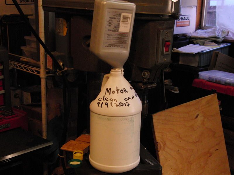 Save motor oil with a modified gallon jug