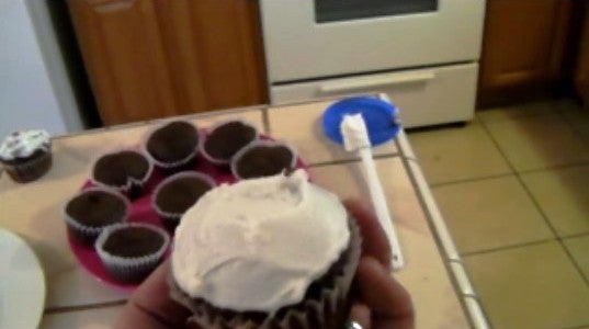 Adding the Strawberry and the Frosting