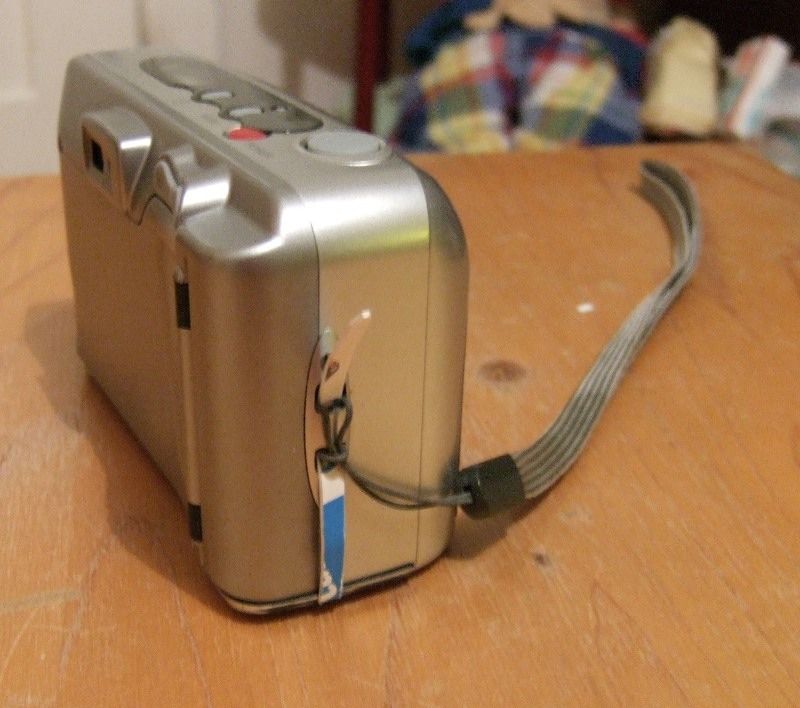 modified camera battery-compartment clasp