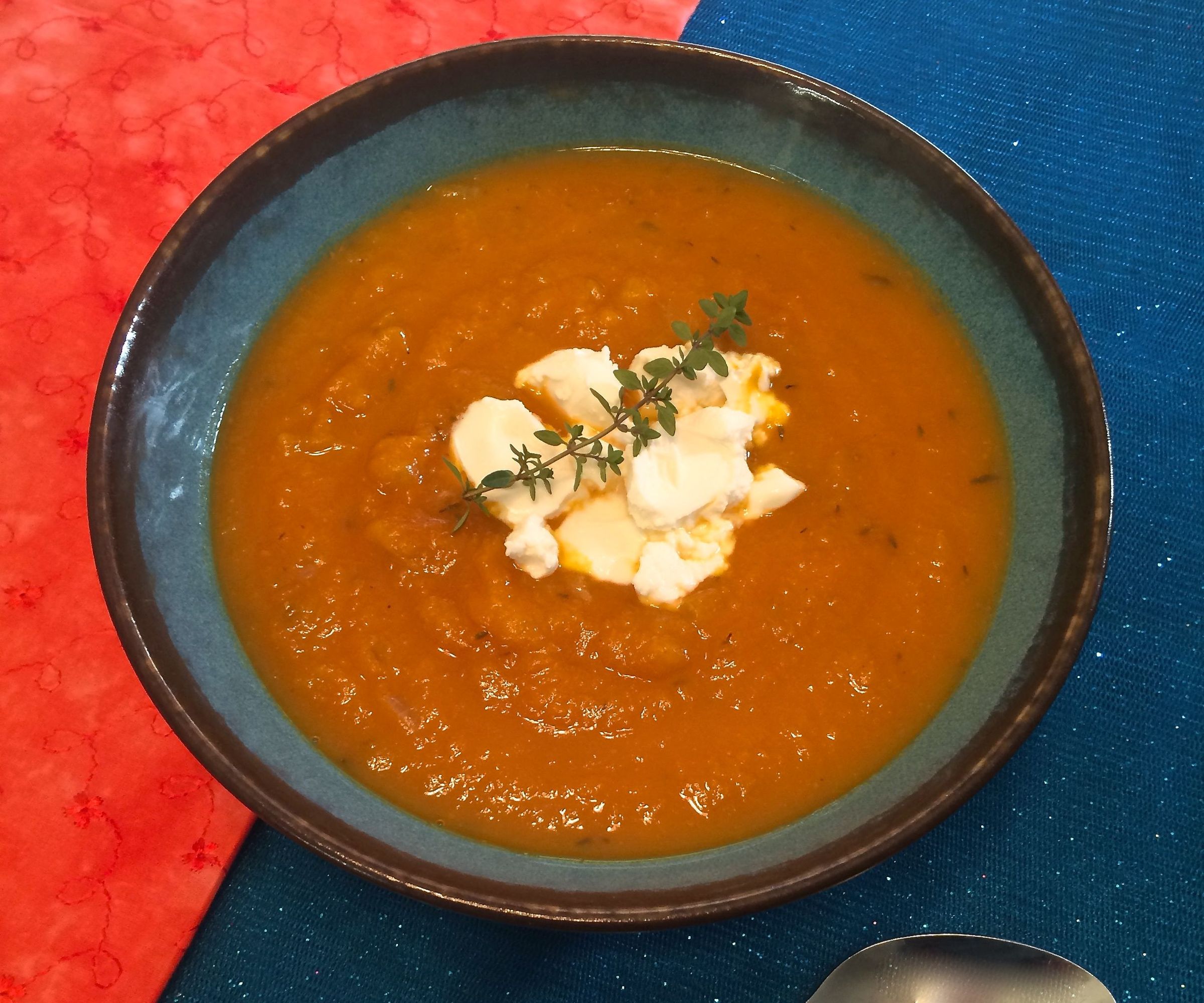 Savory Pumpkin Thyme Soup With Goat Cheese