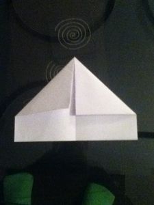 Fold the Top Two Corners Like This Make Sure the Bottom Part Is the Bit That Opens Up.