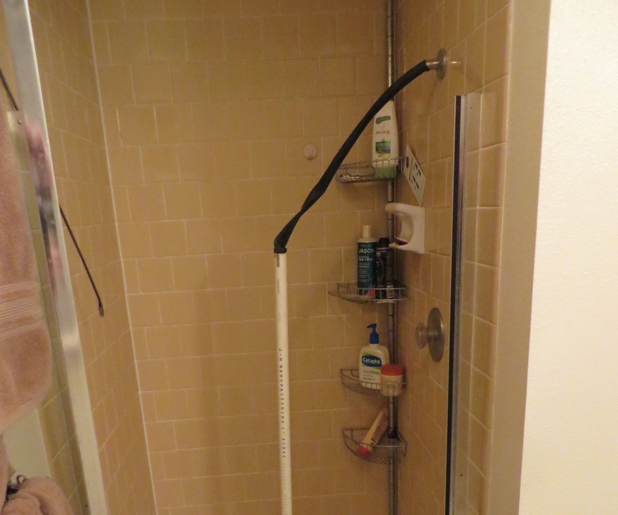 Unclog a Shower Drain With PVC and an Inner Tube