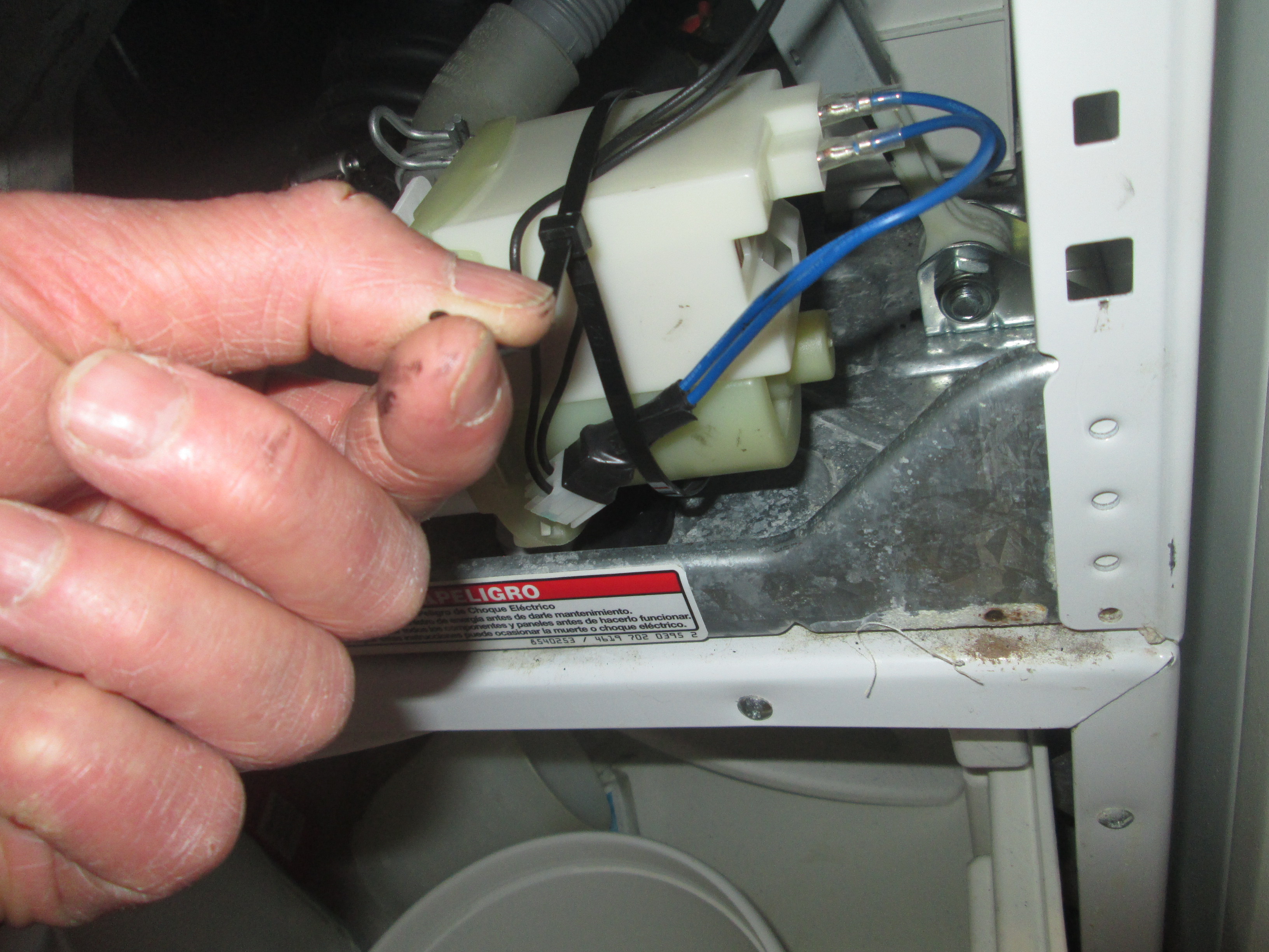 Replace a Drain Pump in a Kenmore / Whirlpool Washer 10 Steps