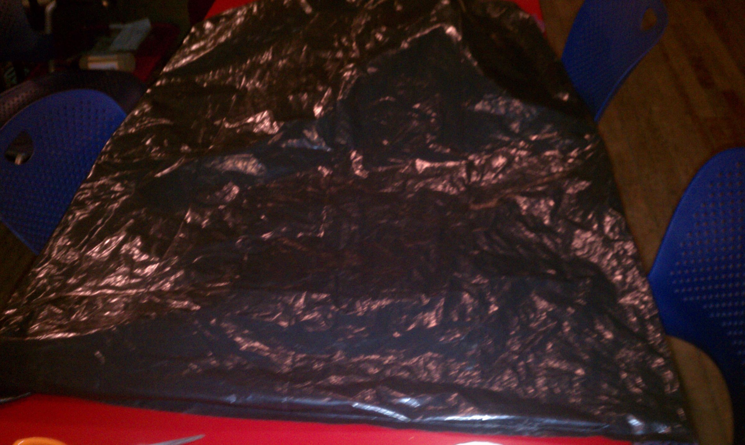 Quick Stylish Raincoat Out of Garbage Bag and USPS Tape 7