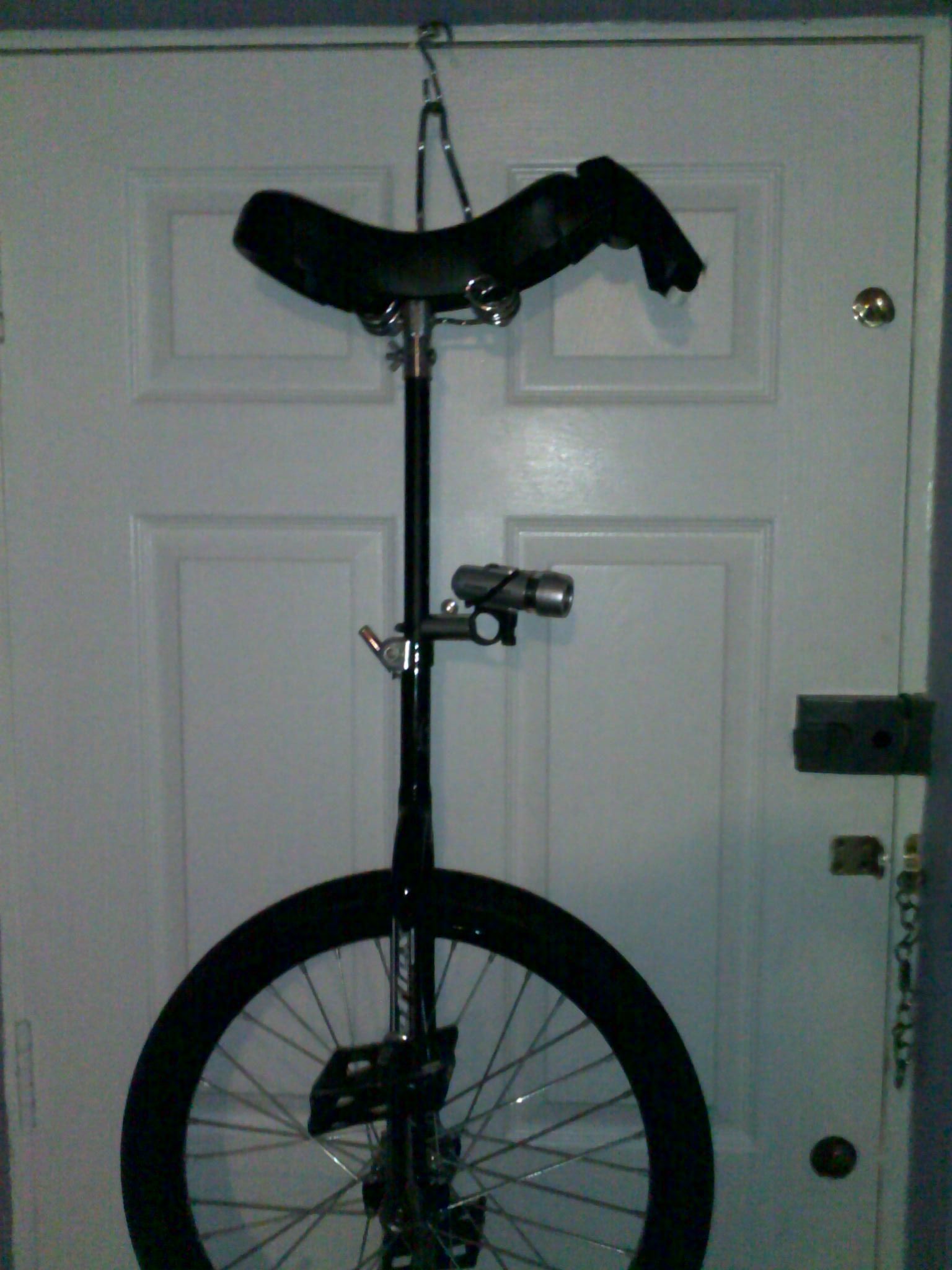 Unicycle Hanger - Made From an Old Saddle