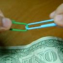 How to connect 2 paperclips with 1 dollar