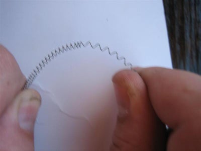 Stretch the Spring Out and Wrap It Around the Flint