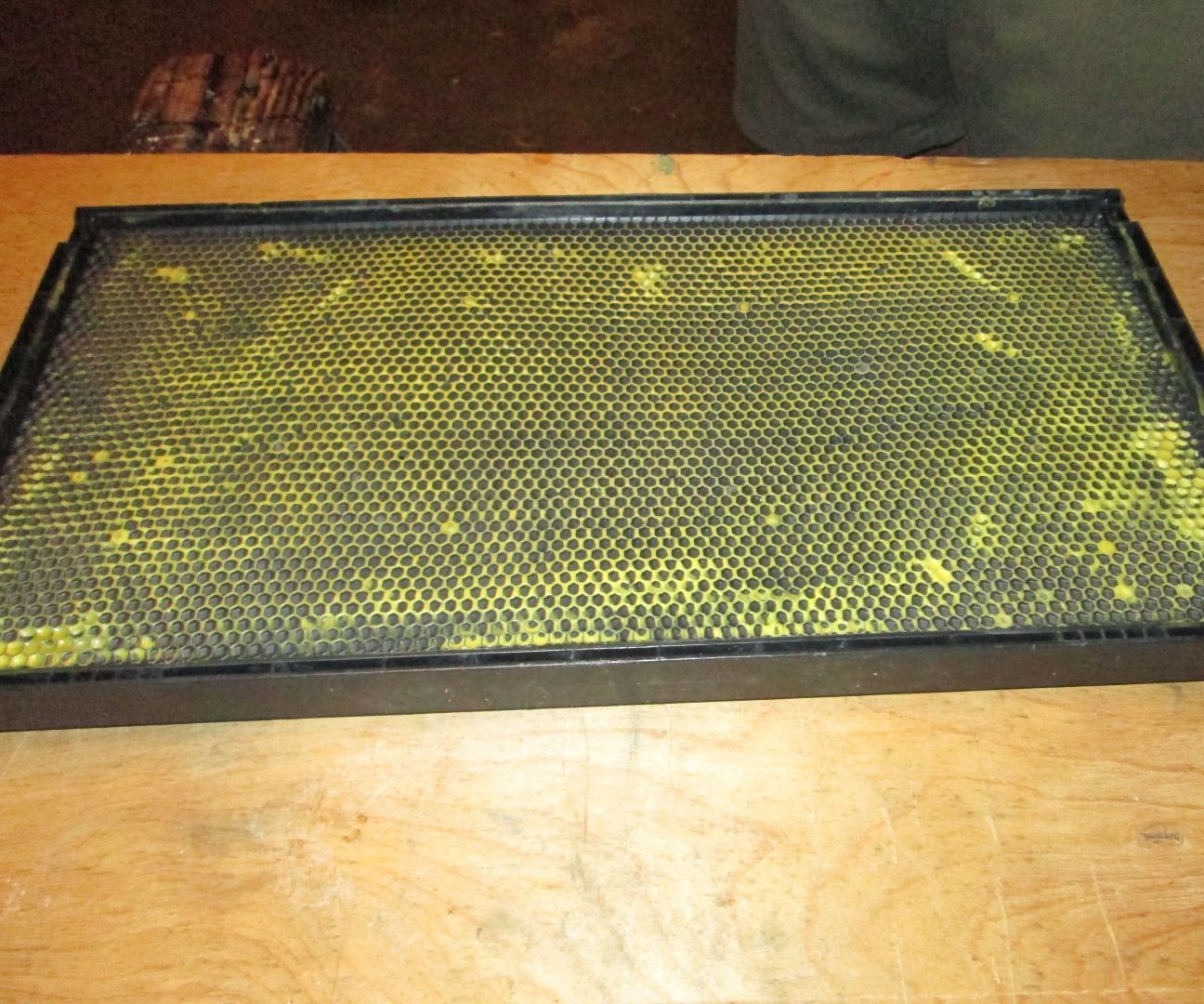 Applying Beeswax to Plastic Beehive Foundations