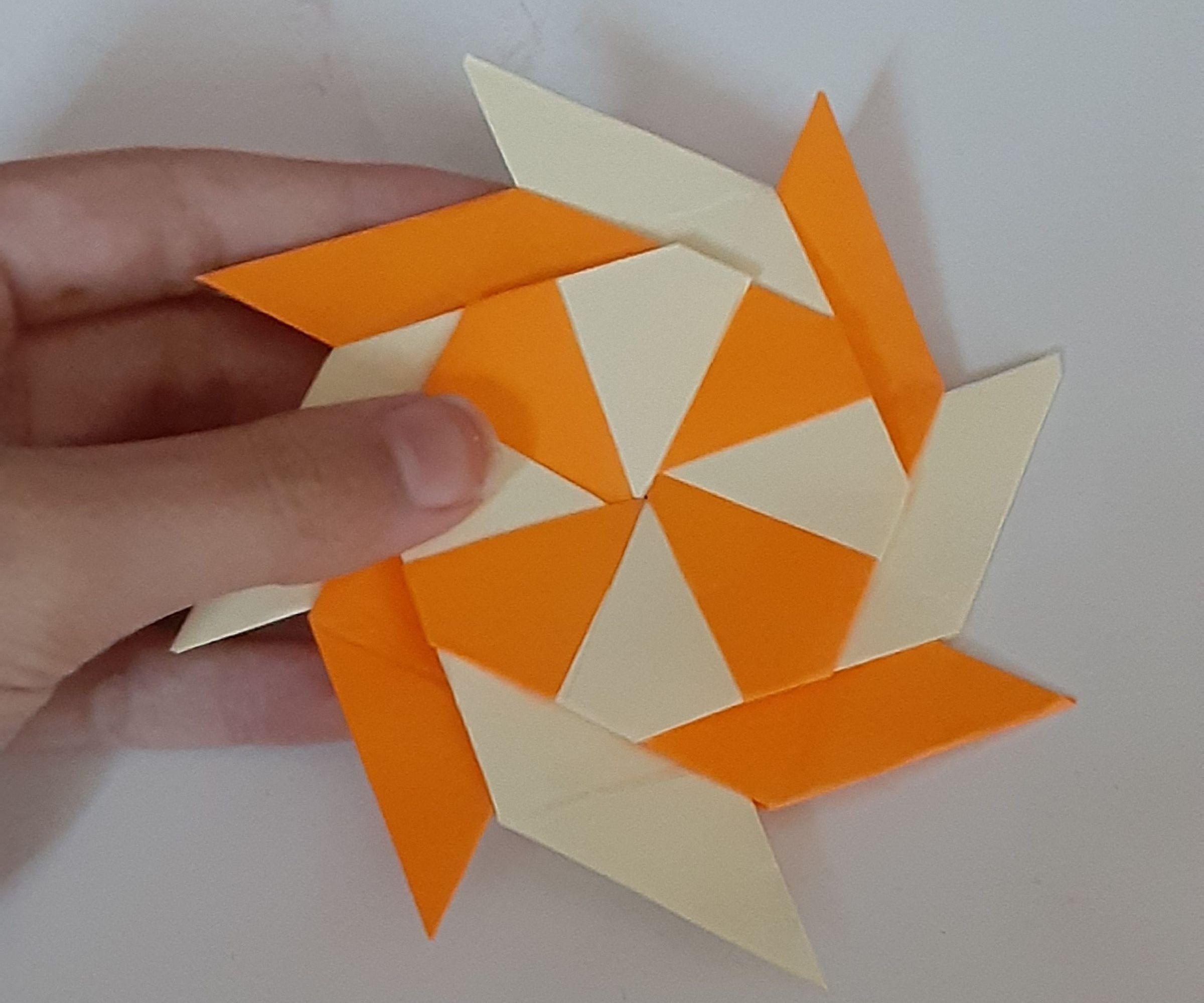 How to Make a Transforming Paper Ninja Star.