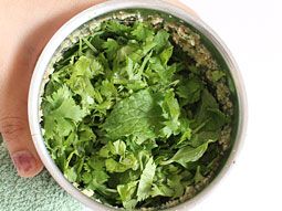 Add Coriander Leaves, Mint Leaves, Lemon Juice and Water and Grind Again Until Smooth Puree.