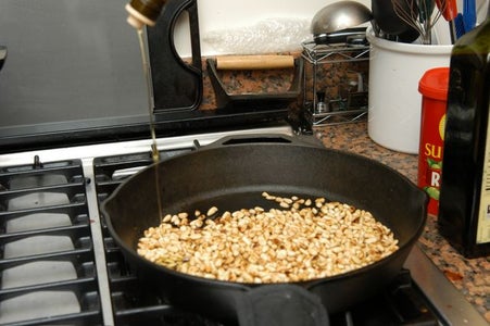 Cover Pine Nuts in Extra Virgin Olive Oil