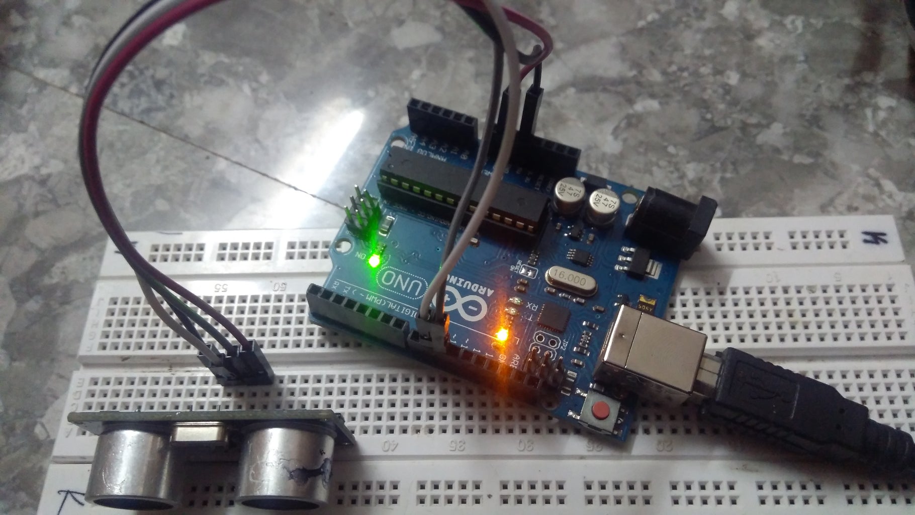 INTERFACING HC- SR04 ULTRASONIC SENSOR WITH ARDUINO