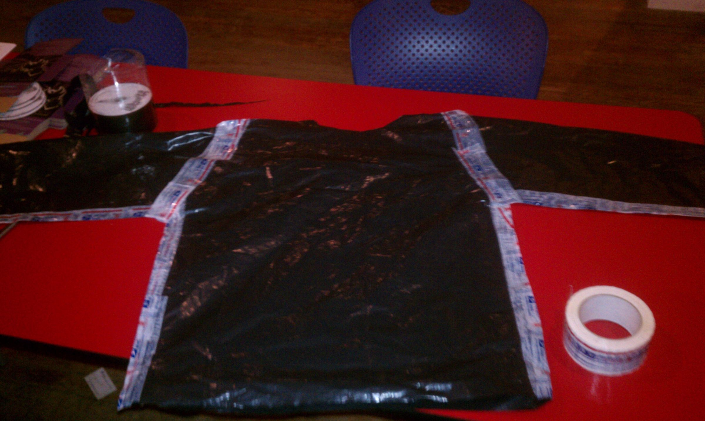 Quick Stylish Raincoat Out of Garbage Bag and USPS Tape 7