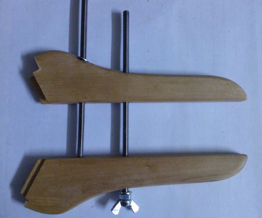Extension Hand and Wooden Clamp From a Hanger  