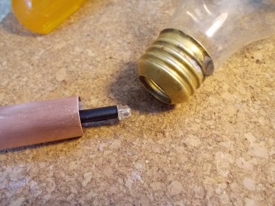 Glue the LED's to the Light Bulbs 