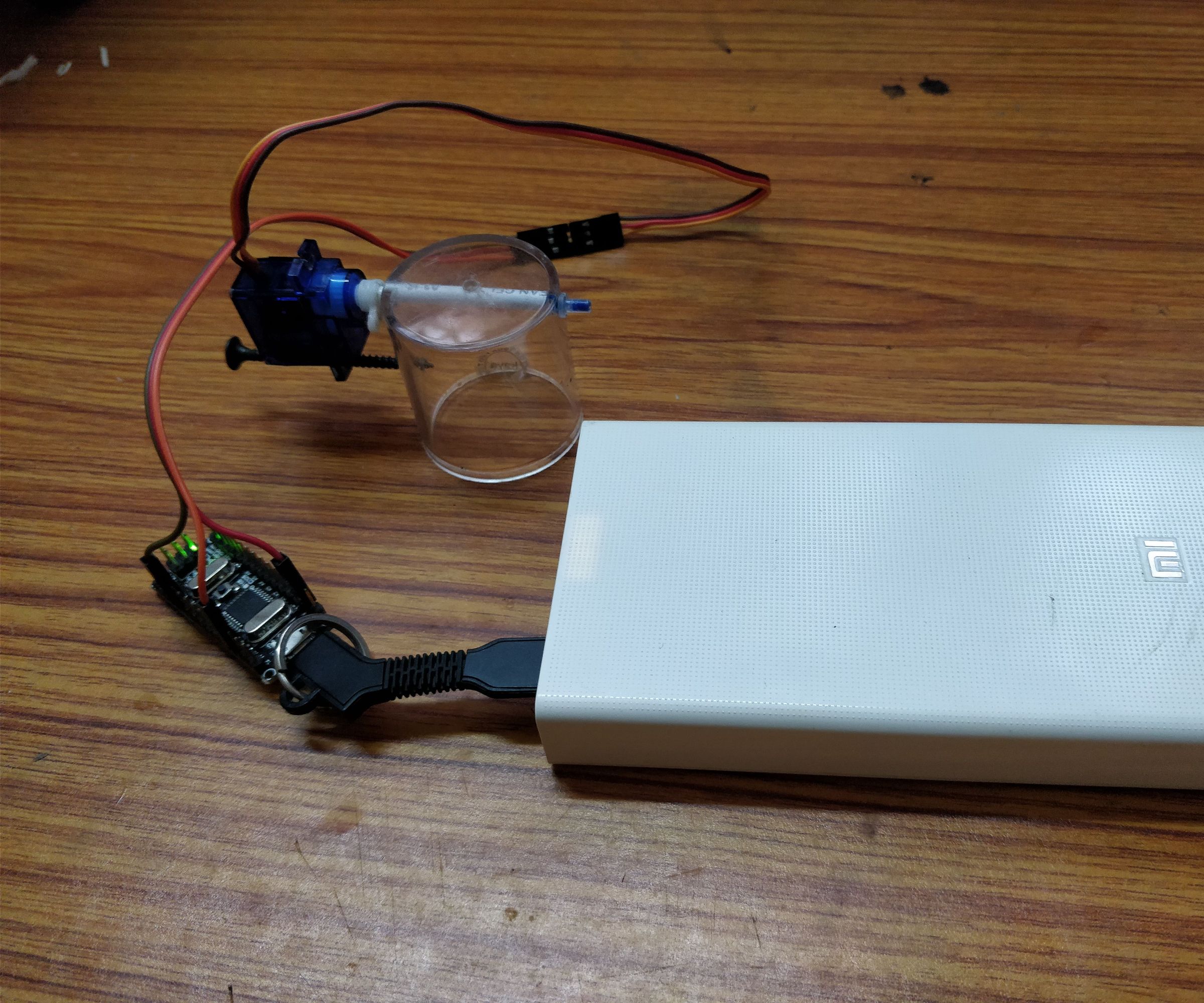 Fish Feeder Using Arduino Nano, Servo Motor and Waste Materials