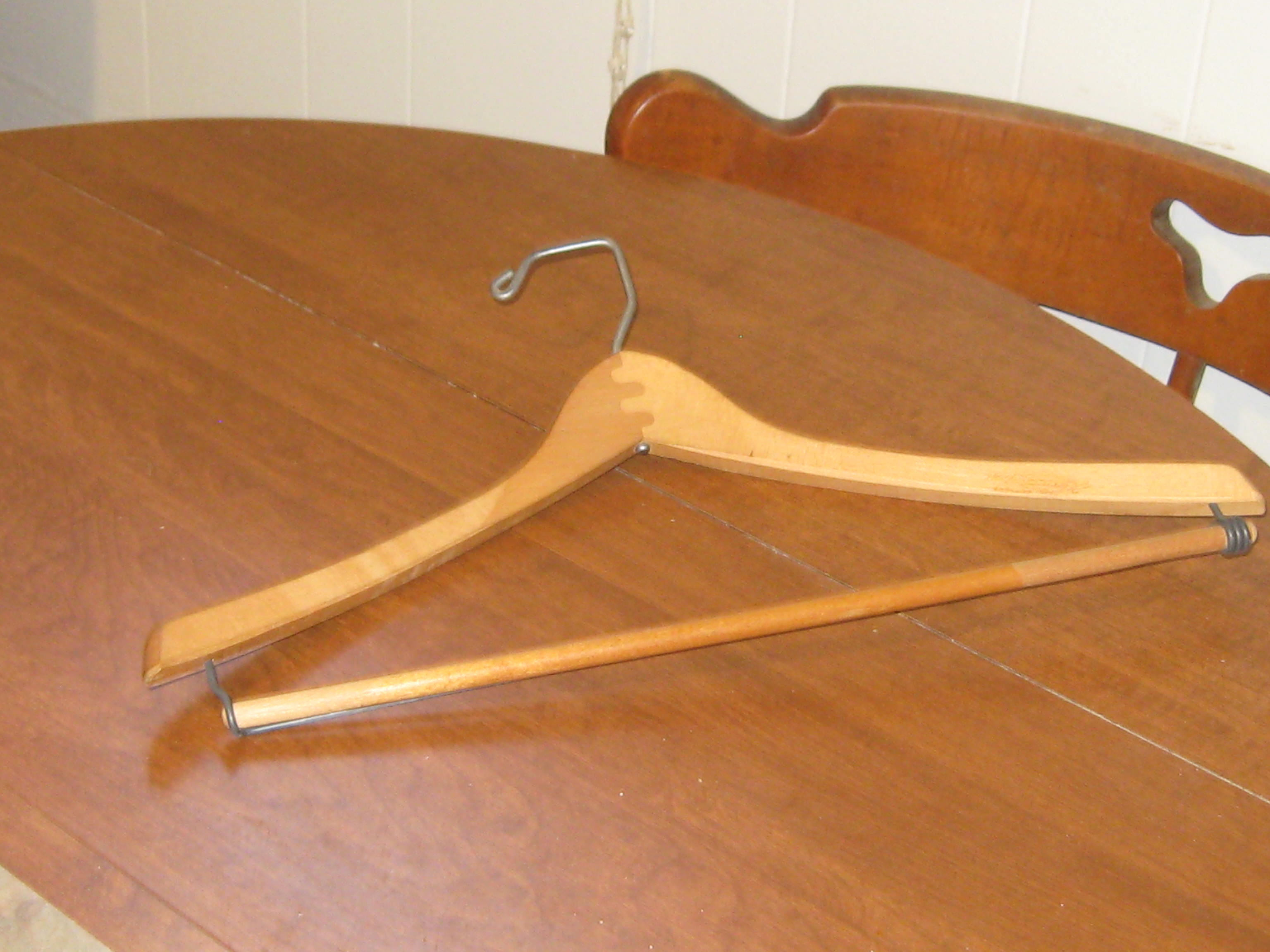 Paper Towel Holder From a Wooden Pants Hanger