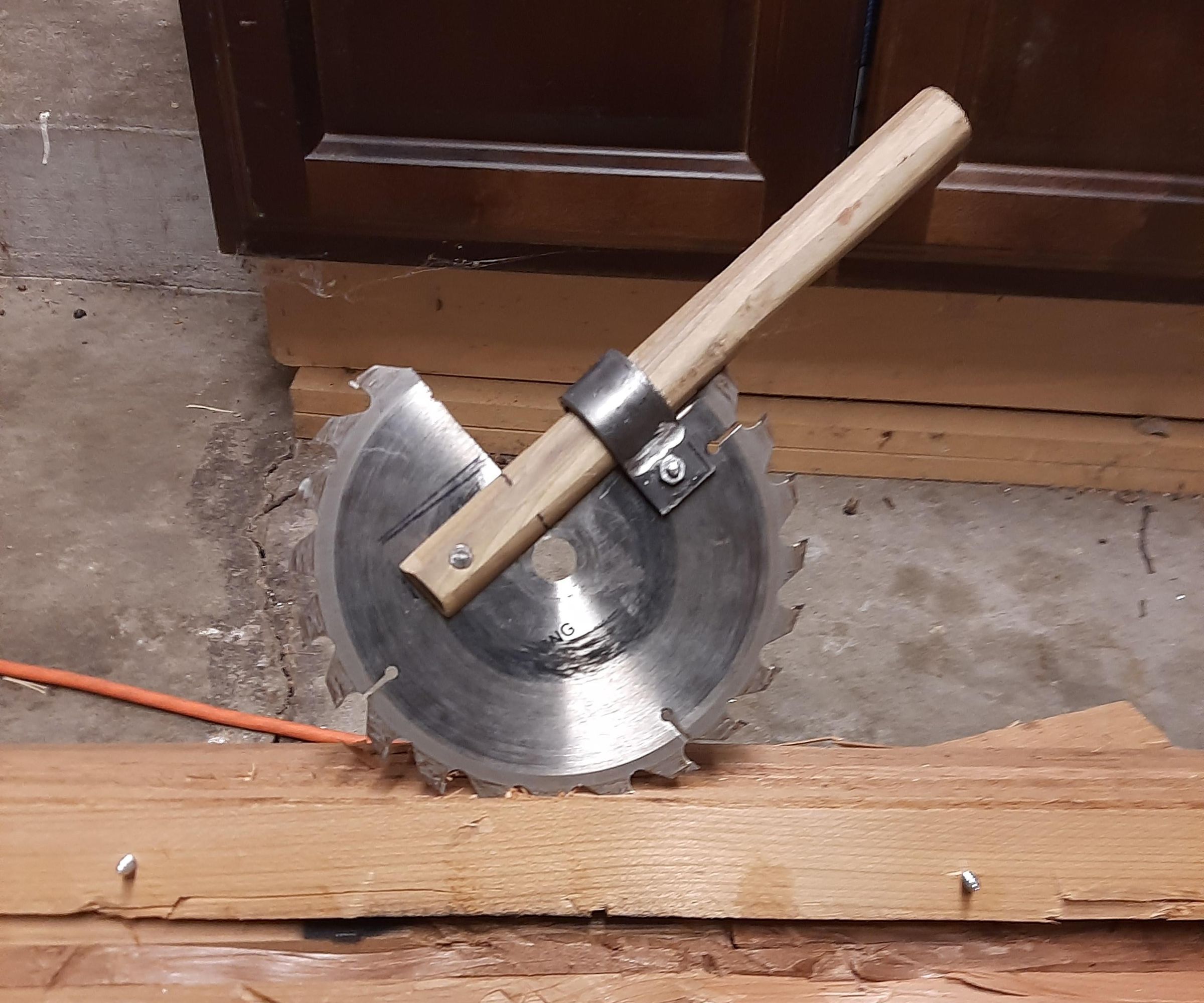 Crafting a Saw Blade Hand Axe to Defend Thyself From Hyena-Bears (and Other Threats)