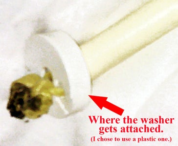 Thread Both Loose Ends of the Rope Through the Washer and Tie in a Knot.