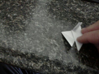 Fold the Ends Over Like Closing a Cardboard Box.  the Last One You Will Have to Go Over and Tuck Under