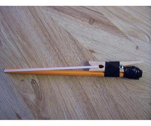 Elastic Gun Using a Pencil, Elastic, Clothes Pin and Tape/another Elastic