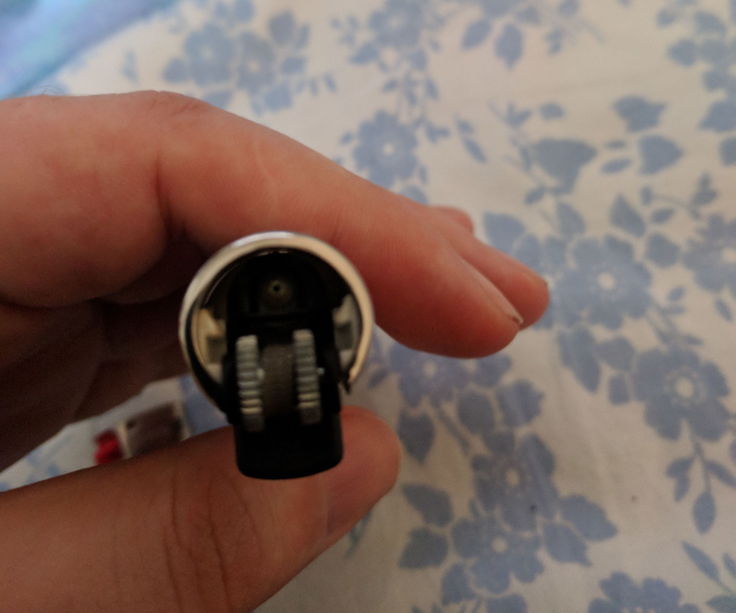 Bic Lighter Wheel and Flint Inside a Clipper Lighter