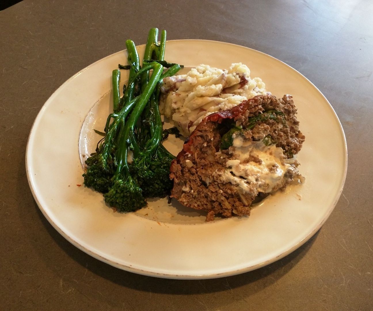 Goat cheese and greens stuffed venison meatloaf!