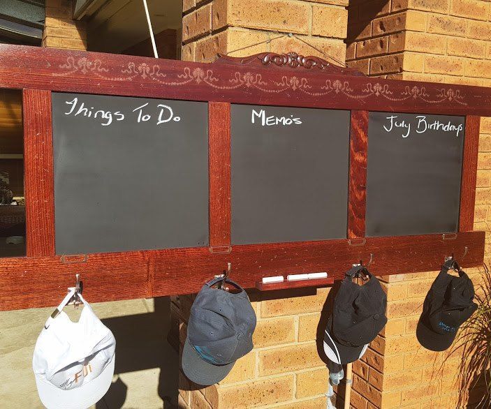 Headboard Repurposed Into a Coat Rack