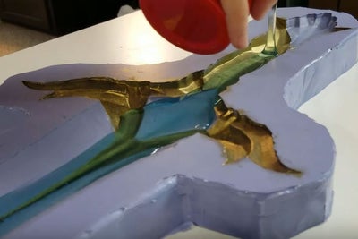 Picture of Remove the 3d Print and Paint in the Pigment Powder (Note Why Our Hilt Looks Different Due to the Pigment Powder)