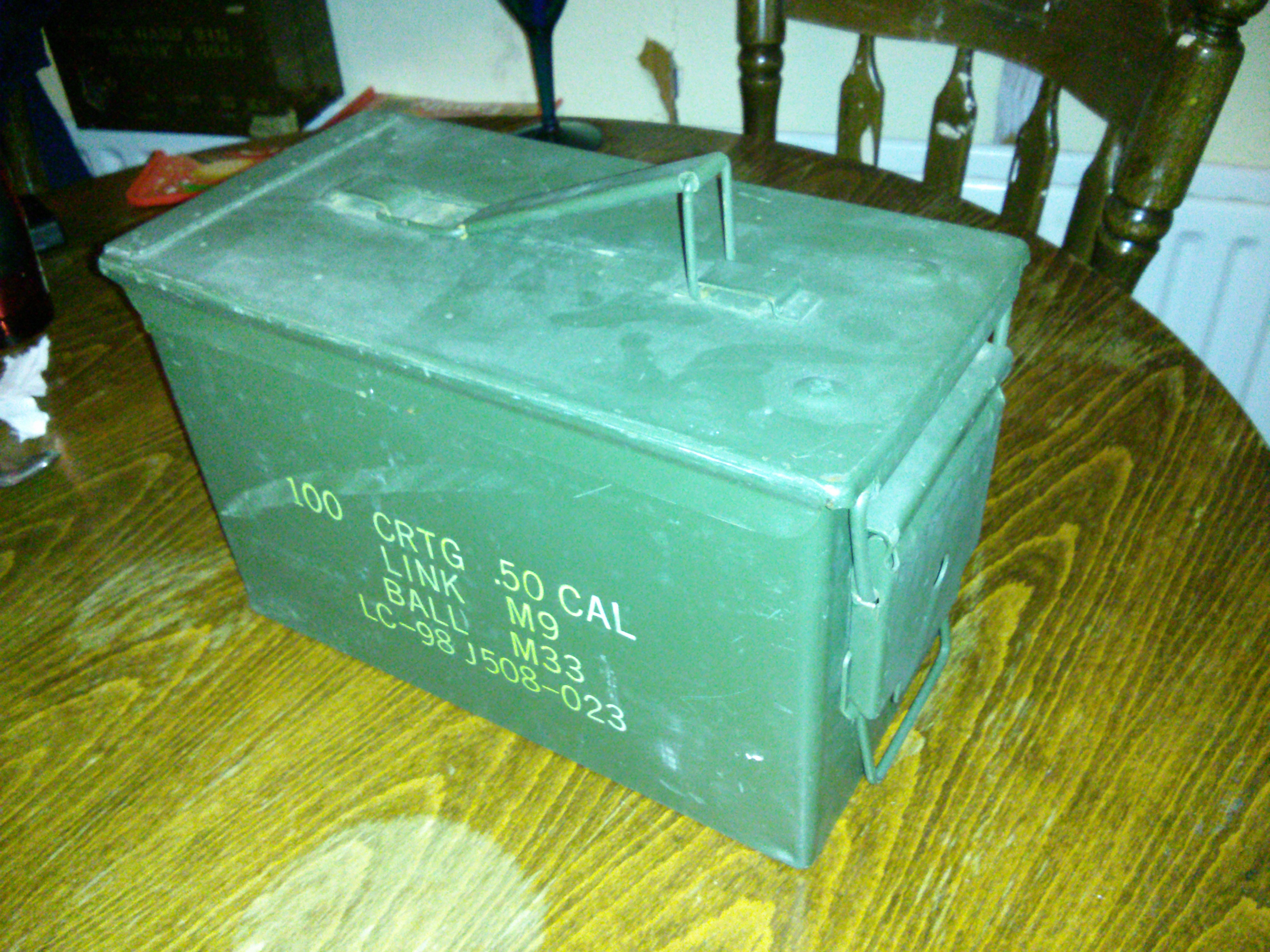 Camping Storage Heater from Bricks, Sand and an Ammo Tin.