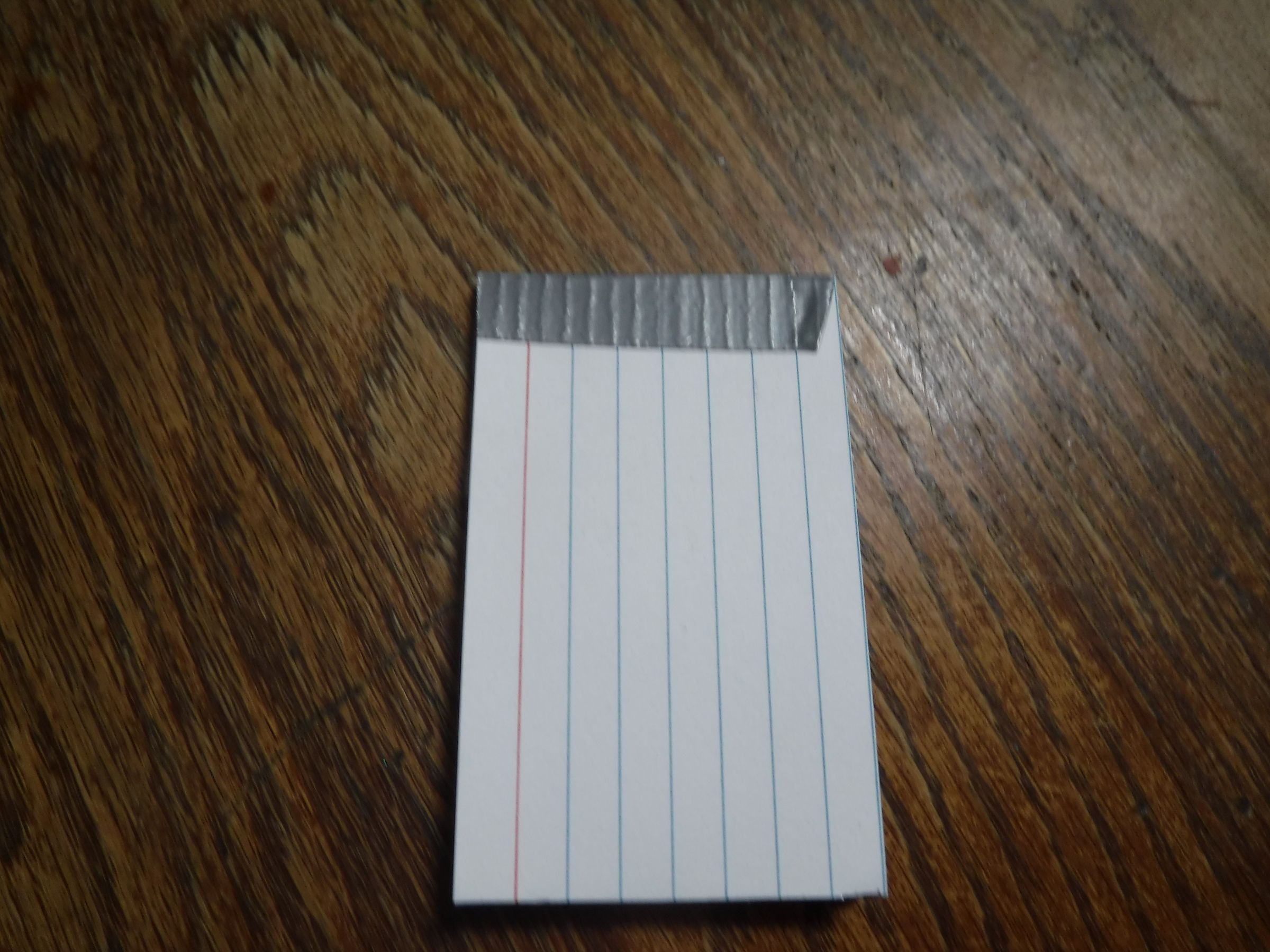 Duct Tape Wallet With Notepad, Pen, and Razer 6 Steps Instructables