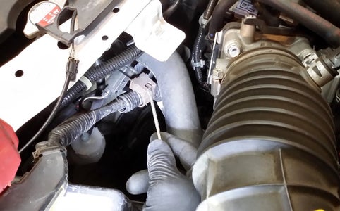 Remove the Battery and Air Intake