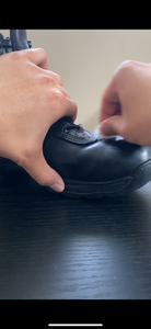 Put Polish on Boot Using Cotton Ball