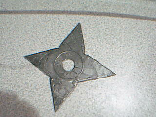 How to make a Shuriken out of a CD!!!!!!