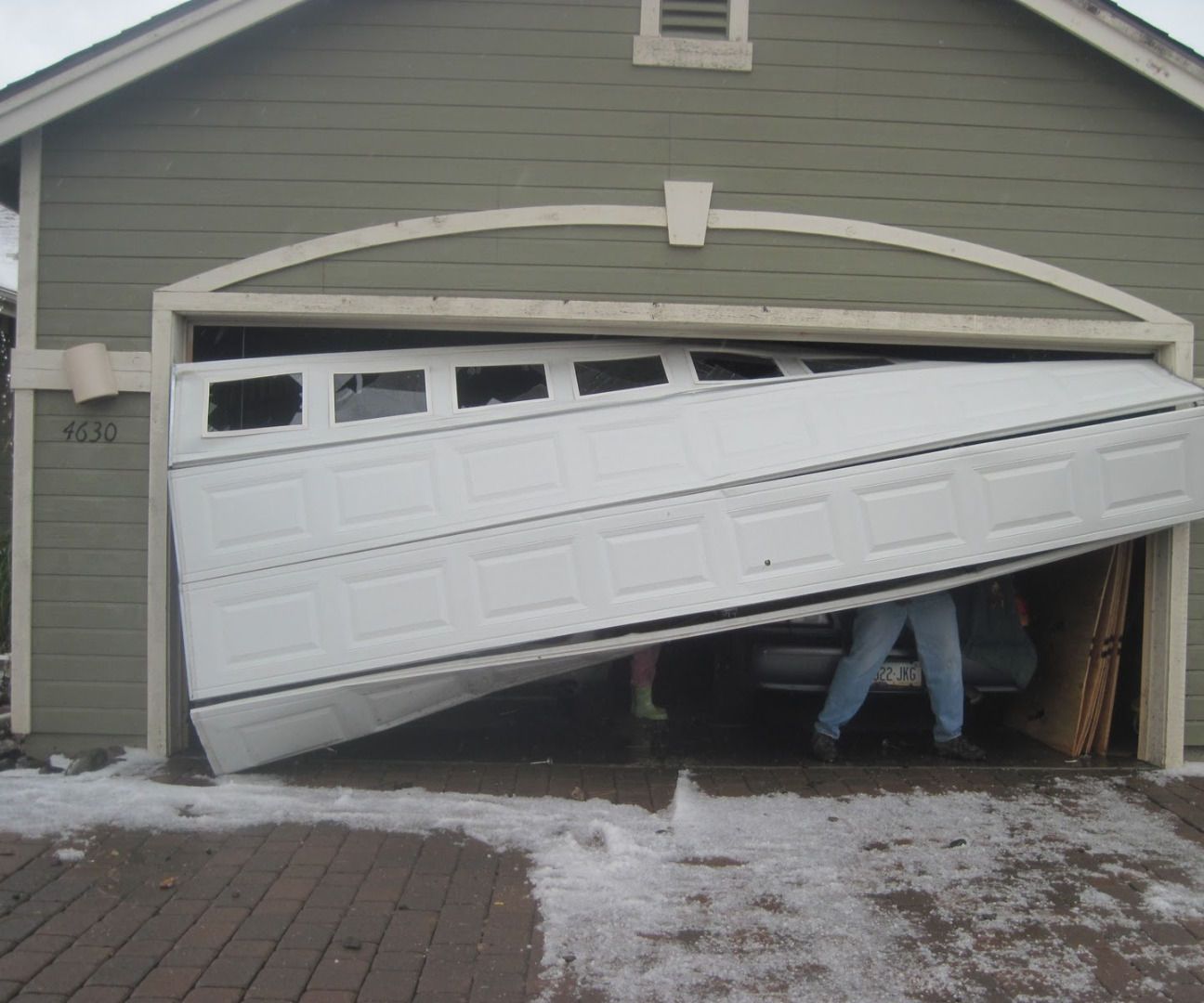 7 WAYS TO FIX a DENT IN a GARAGE DOOR PANEL
