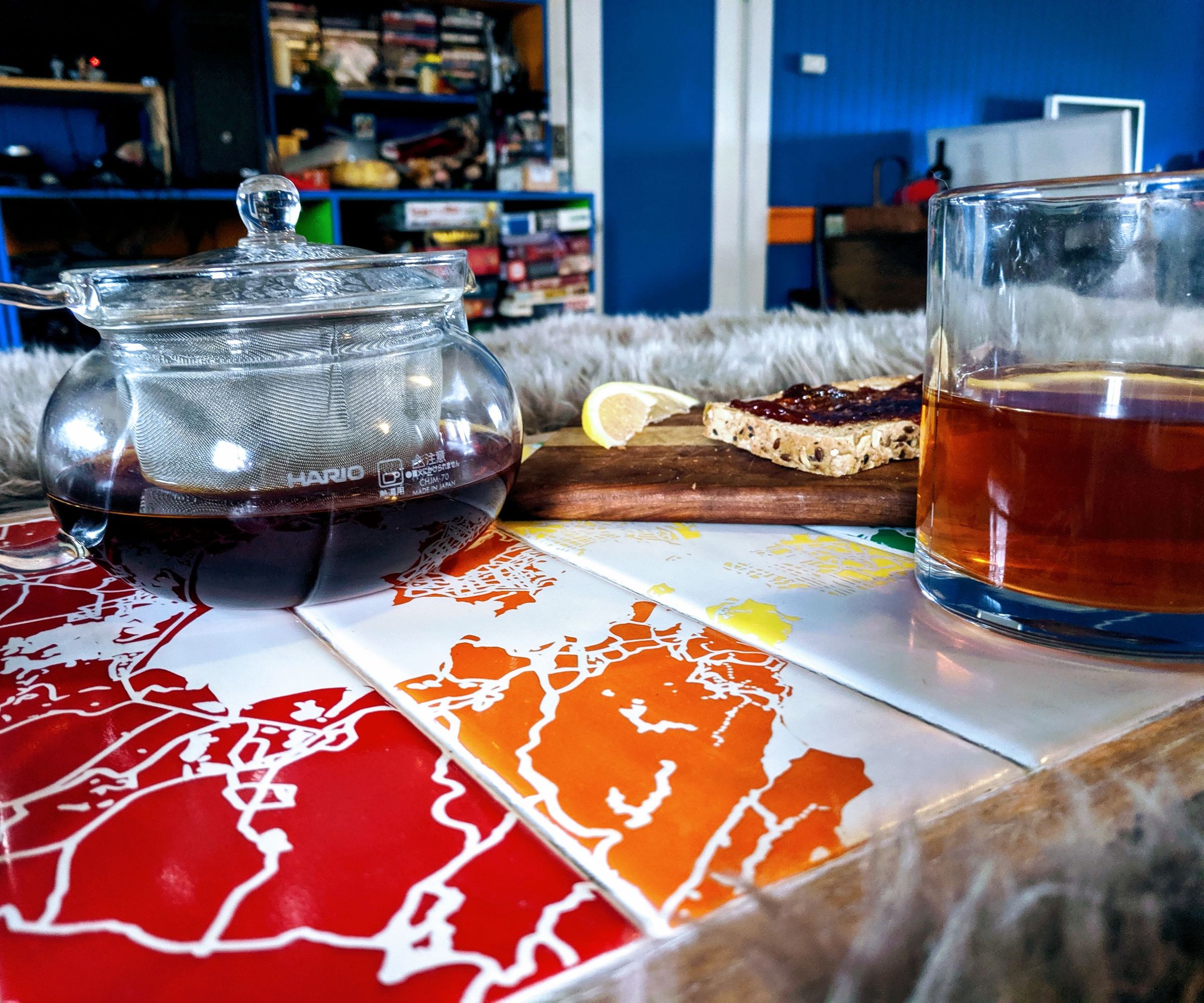 A Decorative Rainbow Map Ottoman Tray