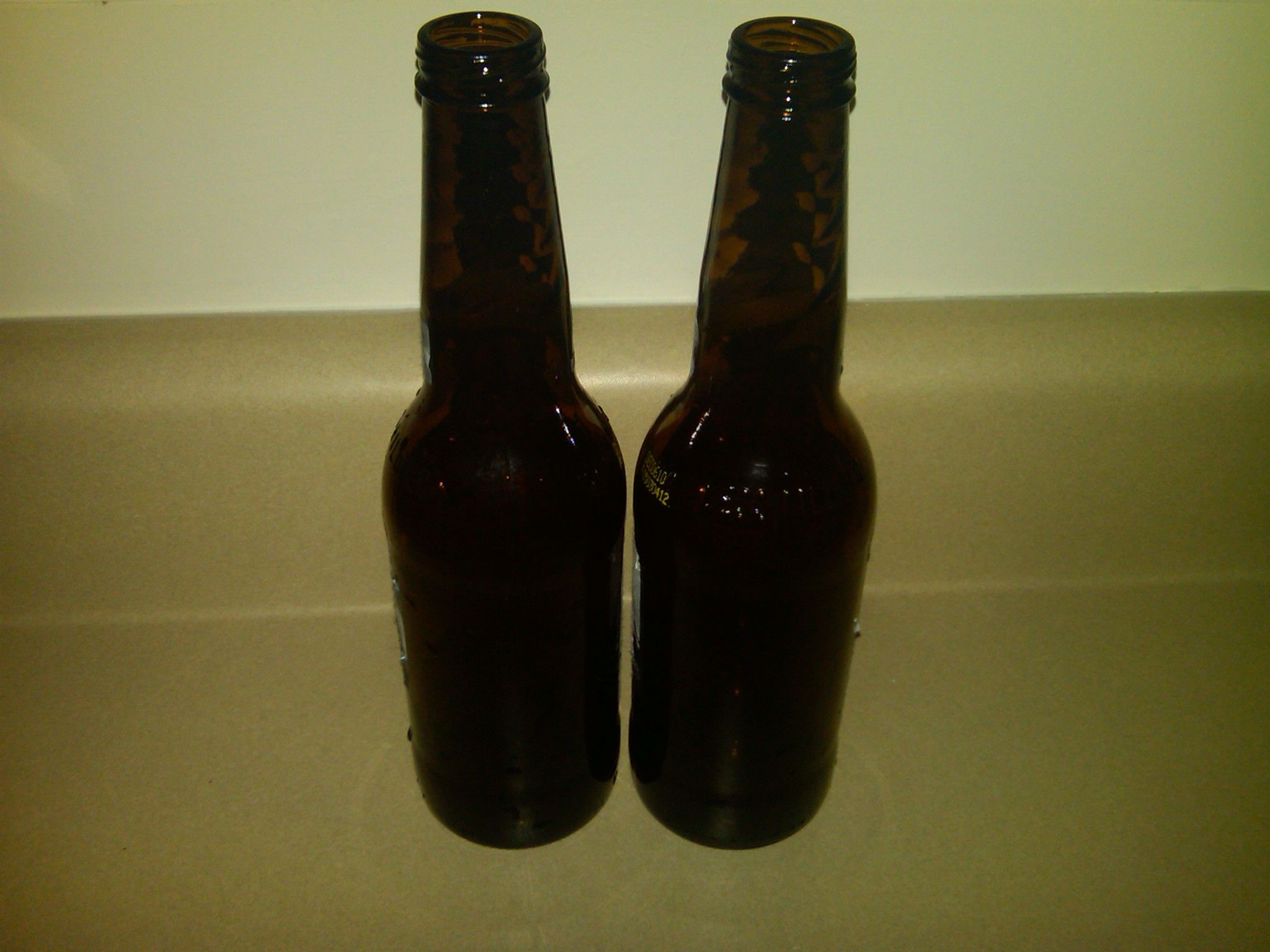 How to Break Off the Bottom of a Glass Bottle