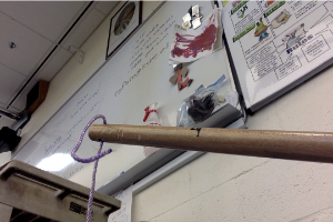 Step 5: Put Other End of Rope Through Hole in Broom Stick 