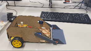 Controllable Box Robot With Scooper