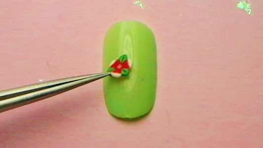 Glue the Fimo Cane Slice to the Nail.