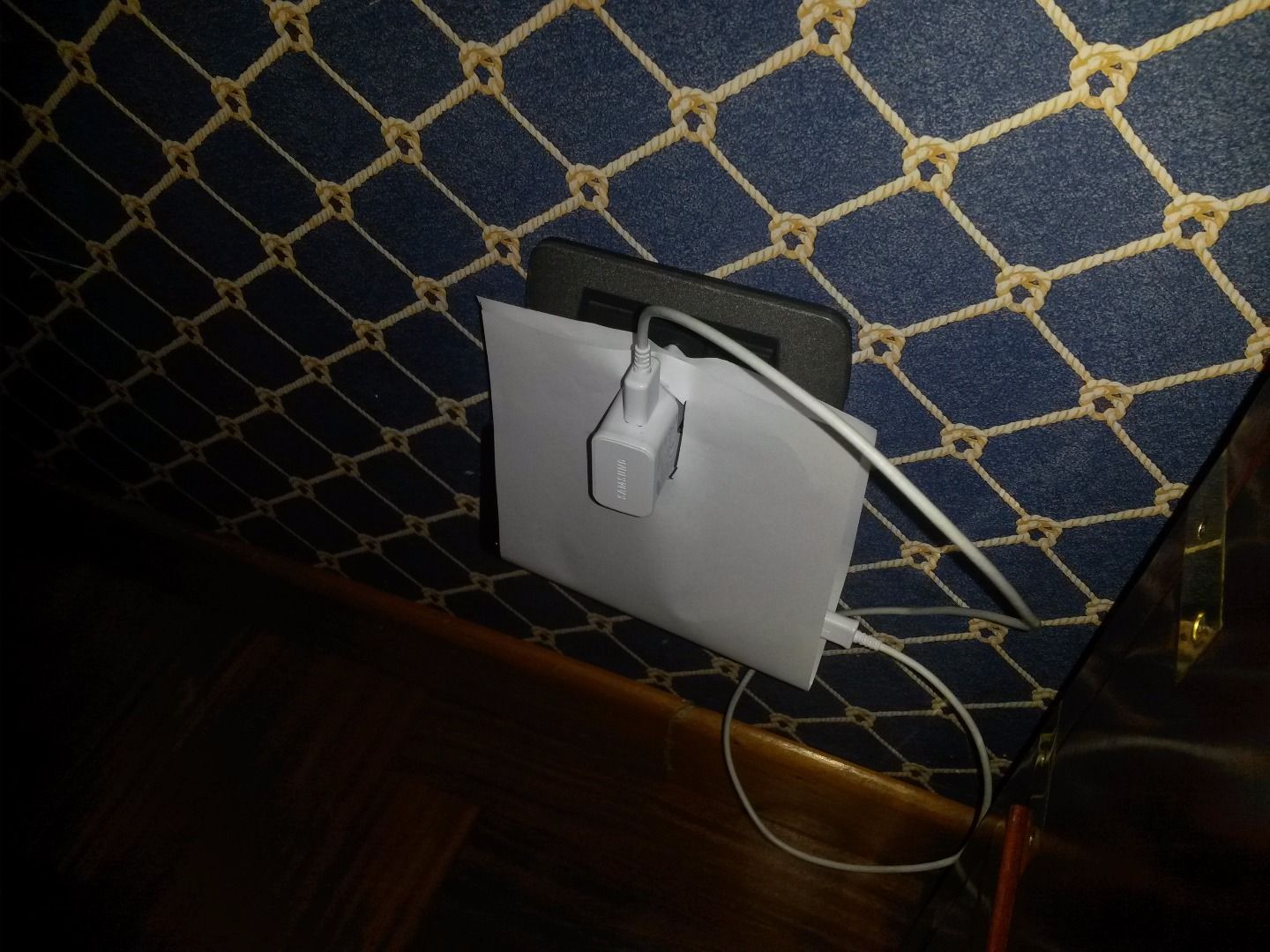 Phone Charger Holder With A Paper Sheet