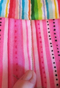 Fit Pocket Strip to Backing.  Sew Pocket Strip Down.