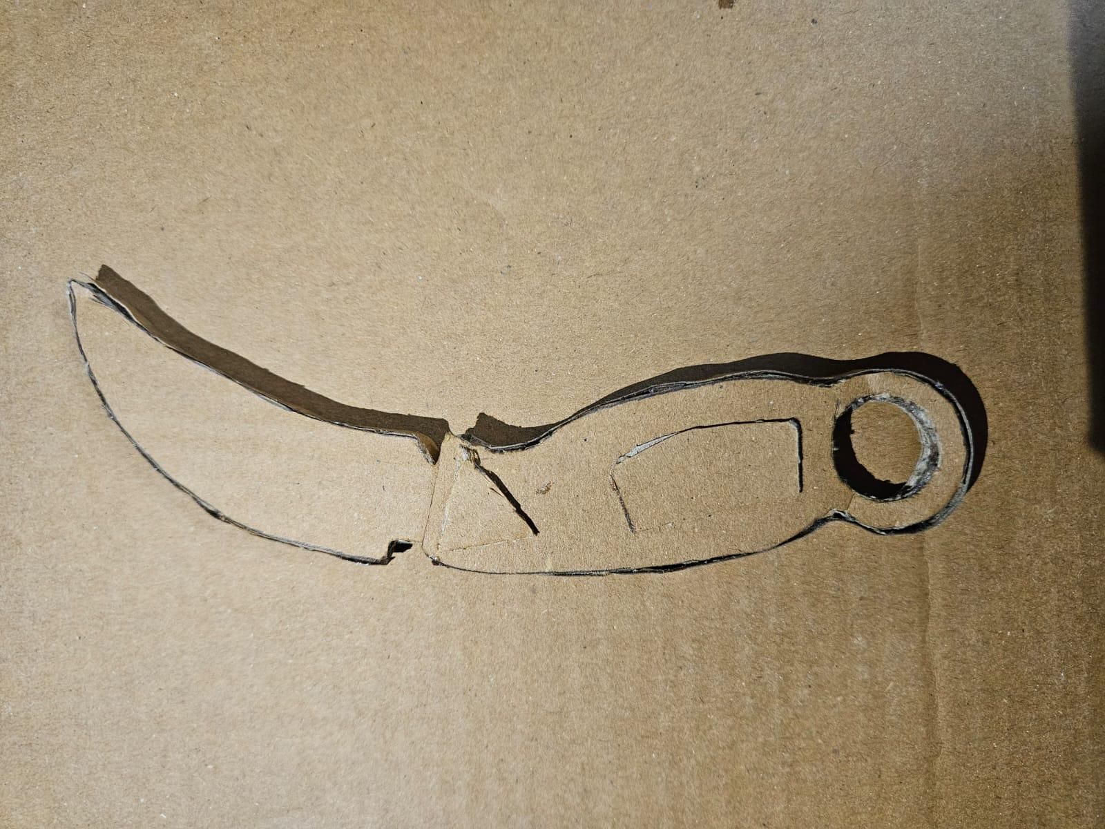 Cardboard Karambit 8 Steps Instructables